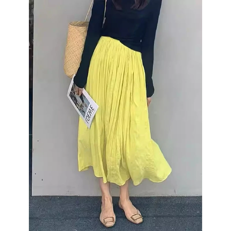 气质好的想转圈圈！法式时尚垂坠感松紧褶皱黄色a字中长款半身裙女