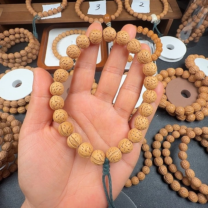 哈***汪桃核吊坠5555555555