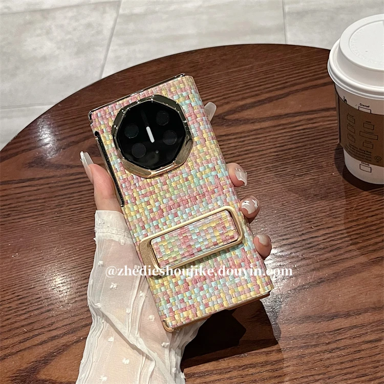 适用华为Mate XT三折叠非凡大师手机壳编织皮纹腕带支架翻盖皮套