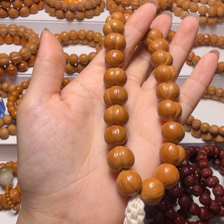 桔****吊坠猴头核桃屁桃