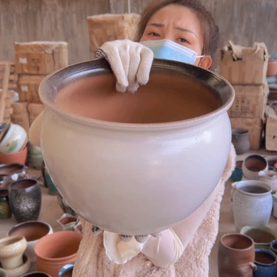 紫砂花盆高24口30。