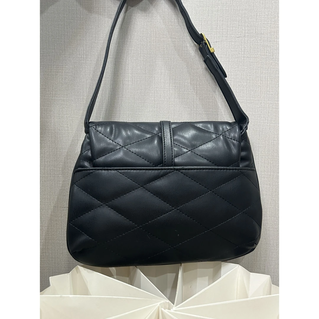 TOLEX2025新款时尚百搭57手工女包黑色