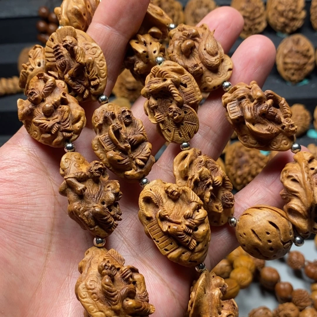 一***生桃核雕刻十八罗汉