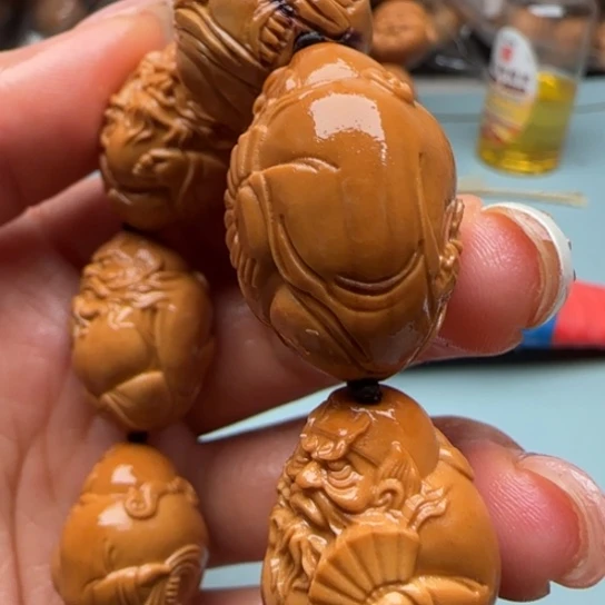 桃核吊坠橄榄雕工艺品