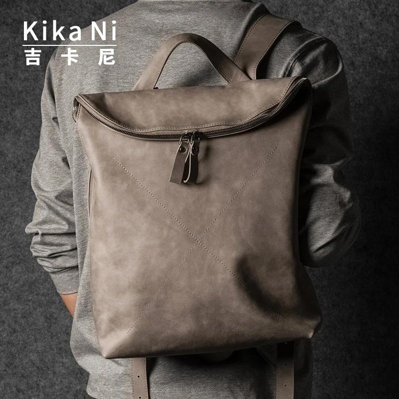 Kika Ni休闲真皮双肩包男士通勤大容量电脑背包商务出差旅行书包