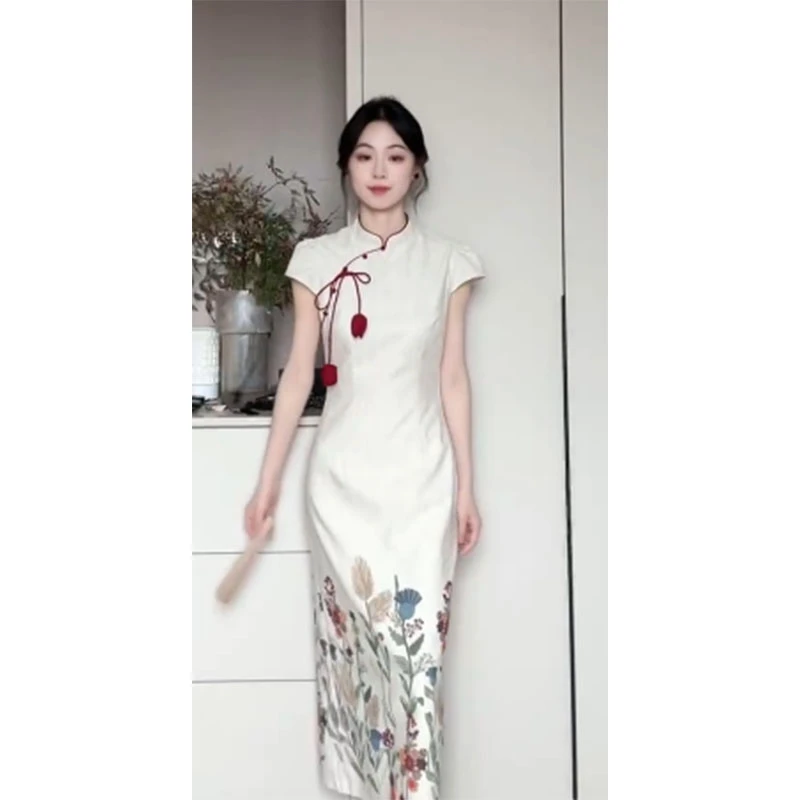 2025秋夏季新款修身显瘦气质时尚高级设计感印花无袖收腰连衣裙女