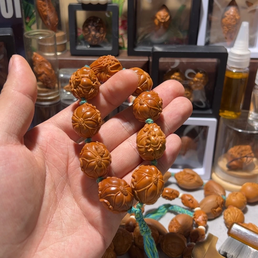 谁***米橄榄核手串/手链手工荷叶群仙