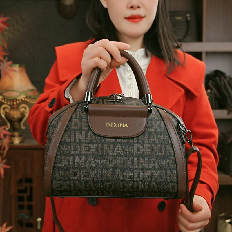 DEXINA/登喜鸟新款时尚百搭经典女士波士顿枕头包单肩斜挎手提包