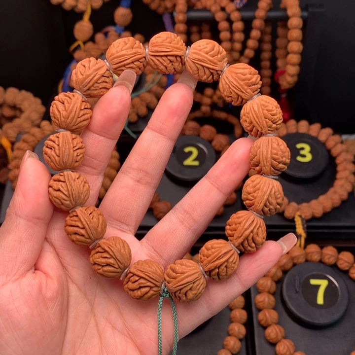 桃核吊坠1.7元宝刺龙手串