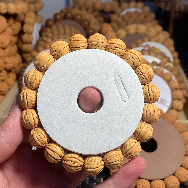 玥***怒手串桃核6#大肠纹金豆