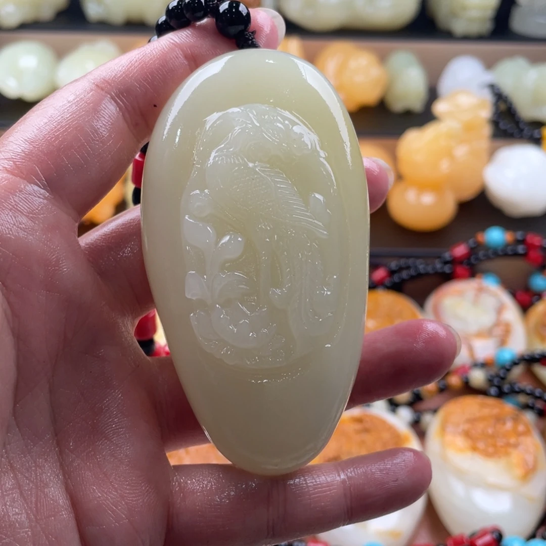 用***恒石材天然古青石手把件