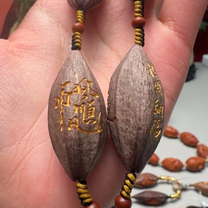彬****手串/手链橄榄核紫皮刻字