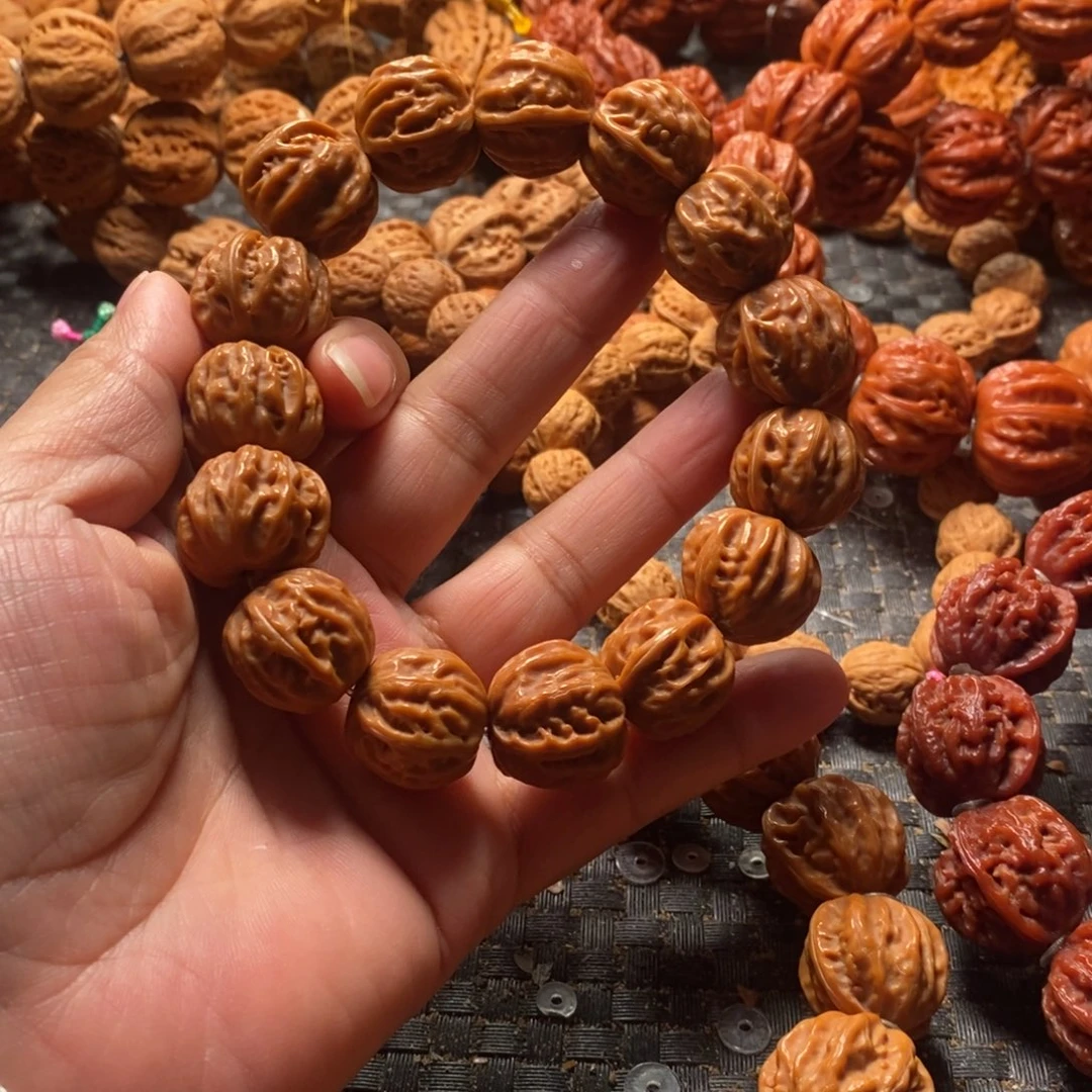 付***余文玩核桃吊坠树王京八棱