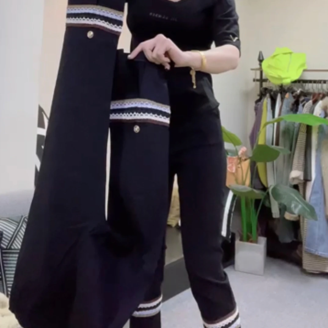 春季新款双条后开衩休闲打底裤