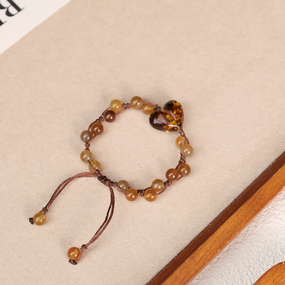 1.3克天然琥珀爱心绳编手链LZ4766-2