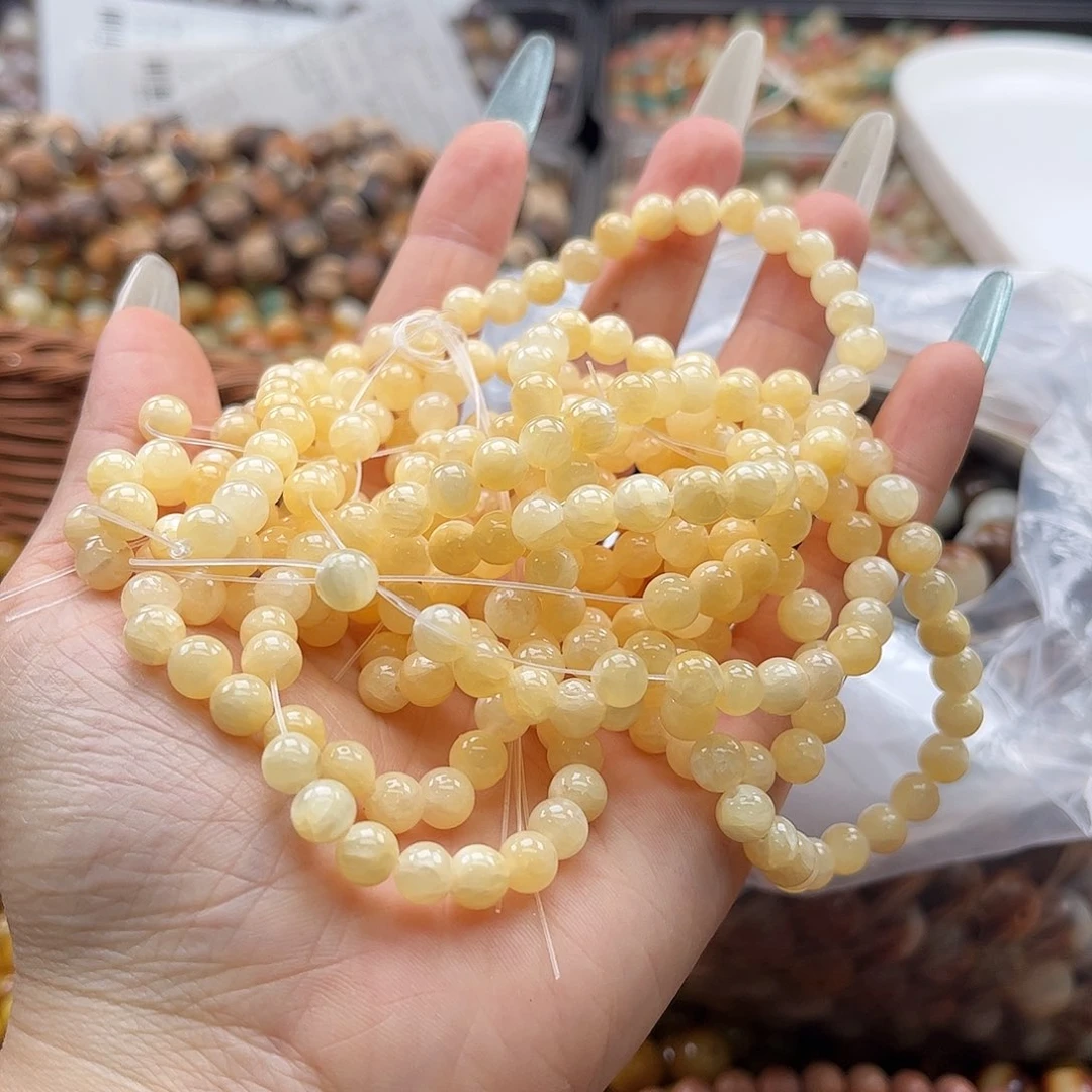 白玉菩提吊坠a6mm/30+6颗米黄玉