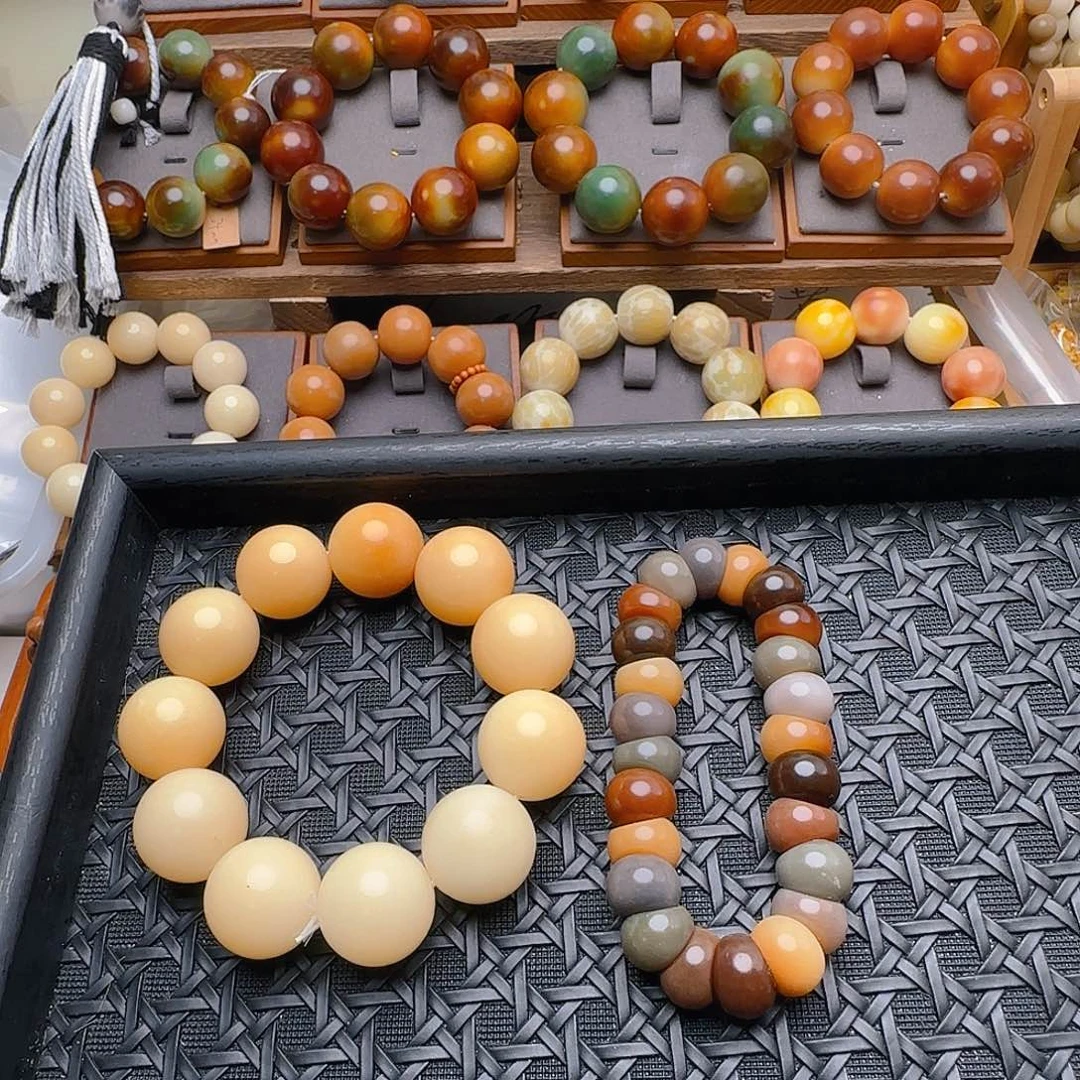 C***Y手串菩提根/象牙果23瑕奶黄圆珠+小蒜瓣