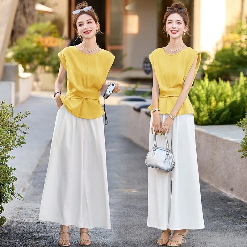 时尚气质套装2025夏季多巴胺减龄穿搭上衣扭结两件套