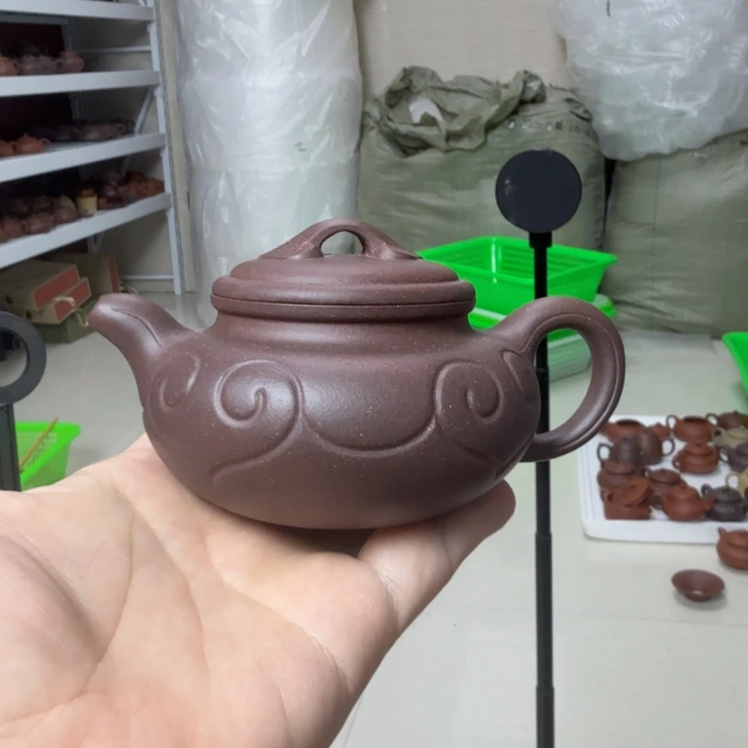 茶杯紫砂微瑕的壶