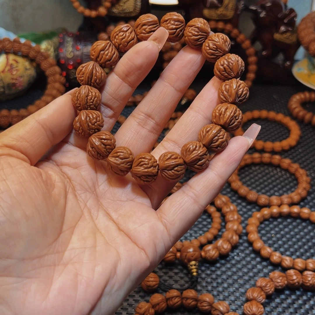 启***星桃核手串16顶级双脊龙单圈