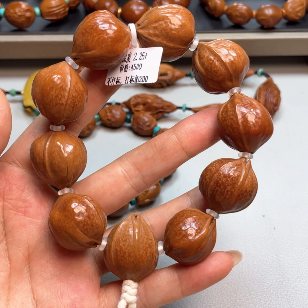 橄榄核吊坠铁核素串