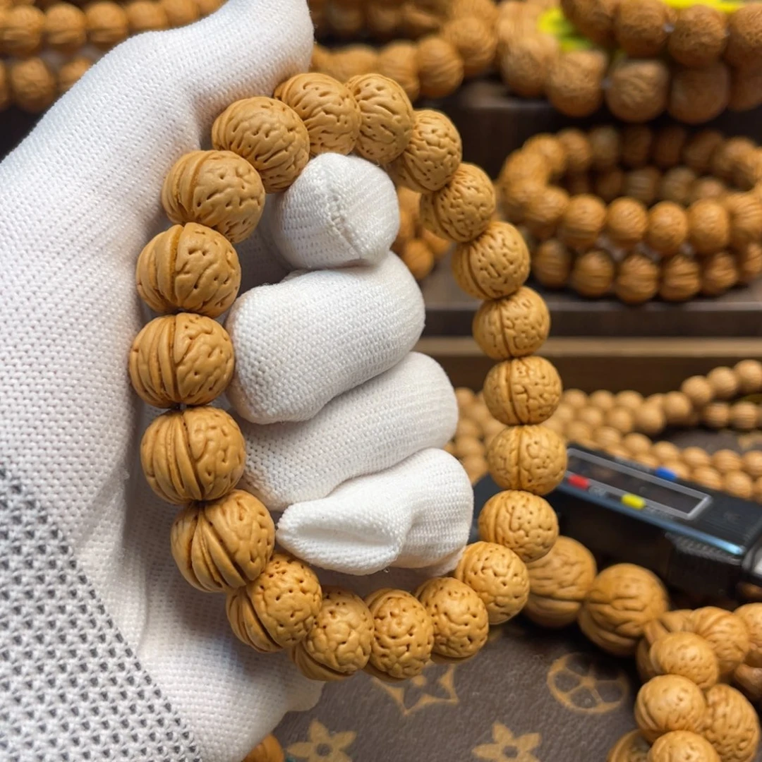 手串桃核孟**真金丹精品