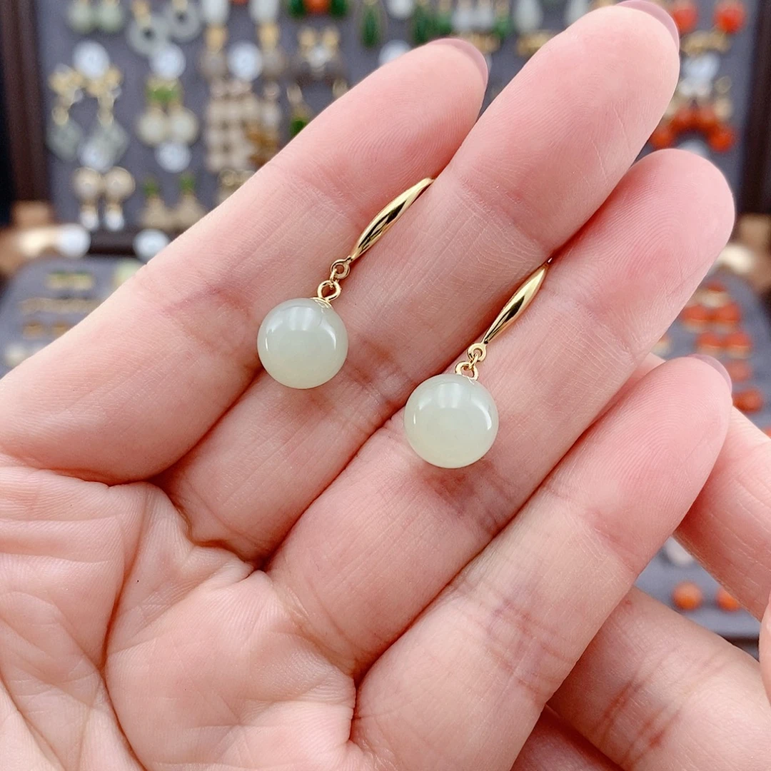 柠****和田玉银S925镶嵌耳饰