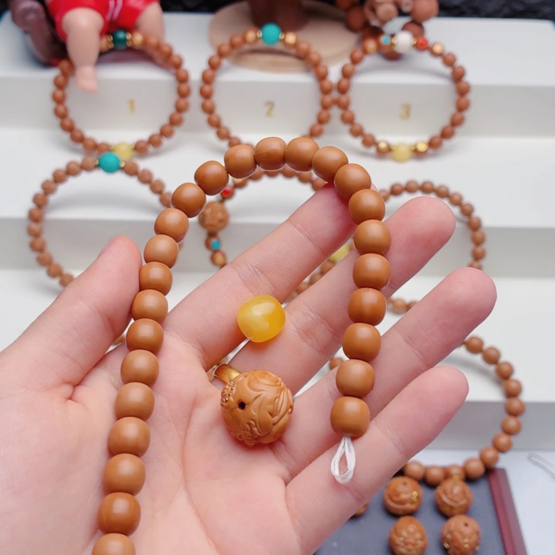 燚***°猴头核桃吊坠猴头手串