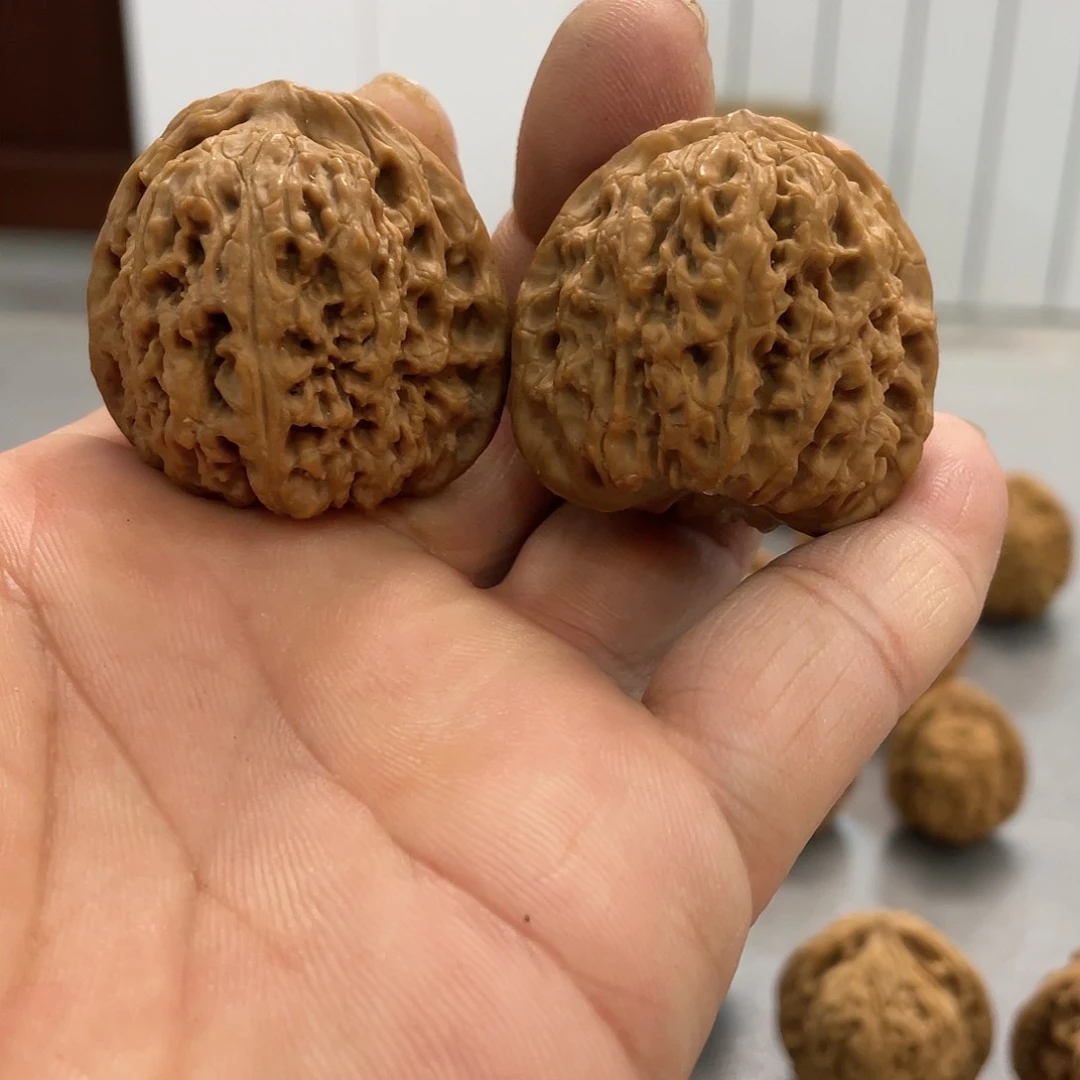 桃核吊坠人**趟文玩核桃南将石