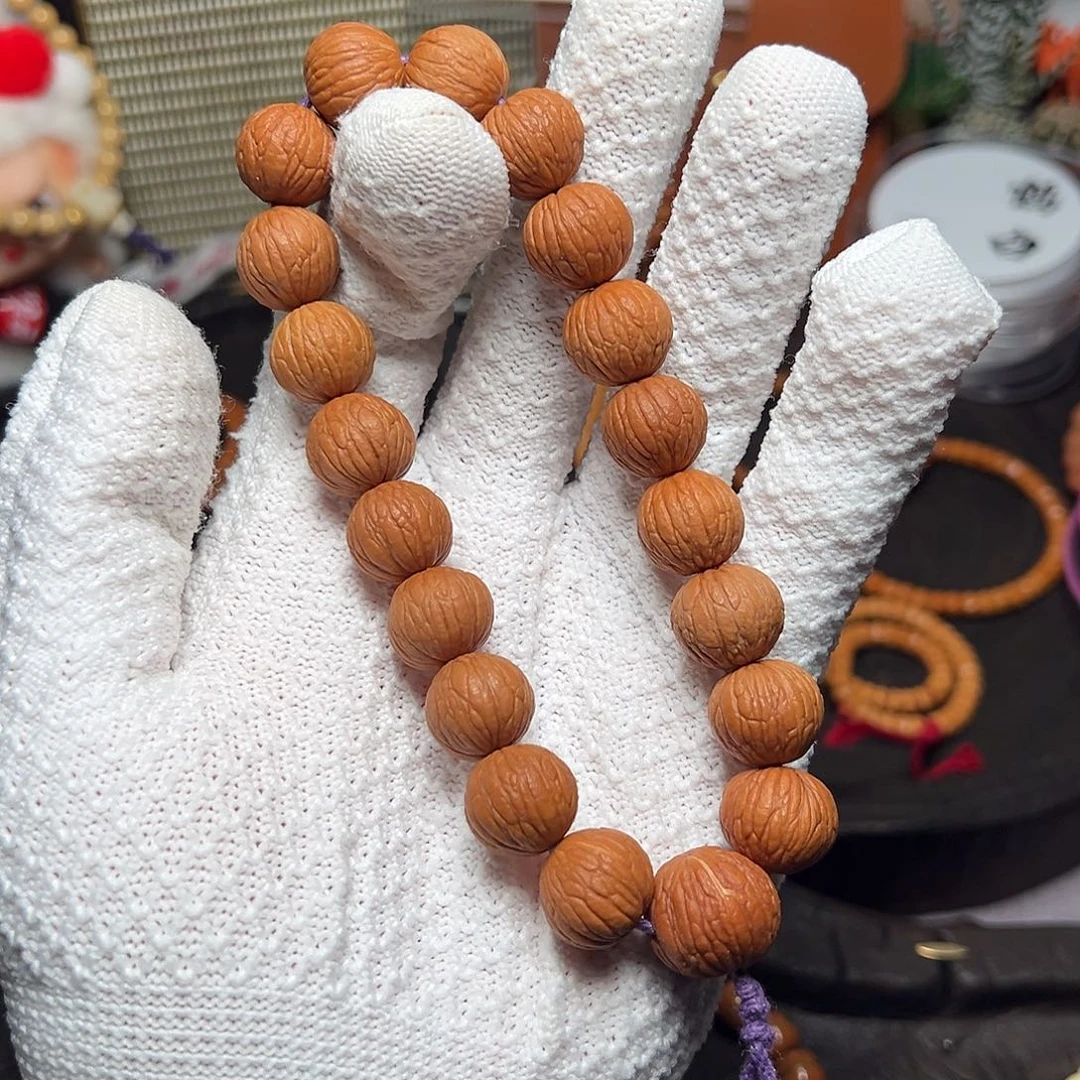 手串橄榄核猴头凤羽手持