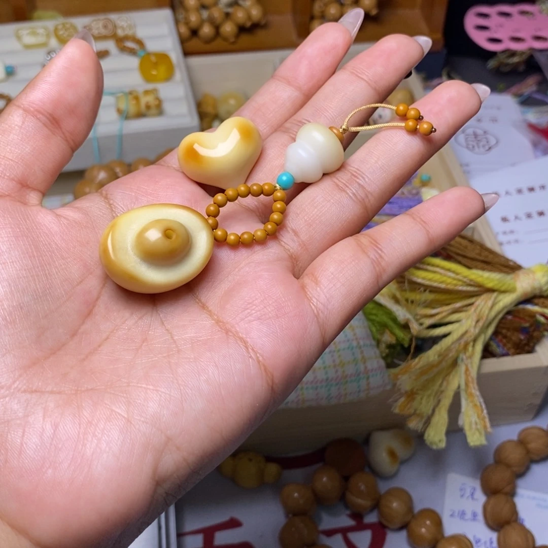 S***n吊坠猴头核桃牙果心 元宝 橄榄核葫芦滴流