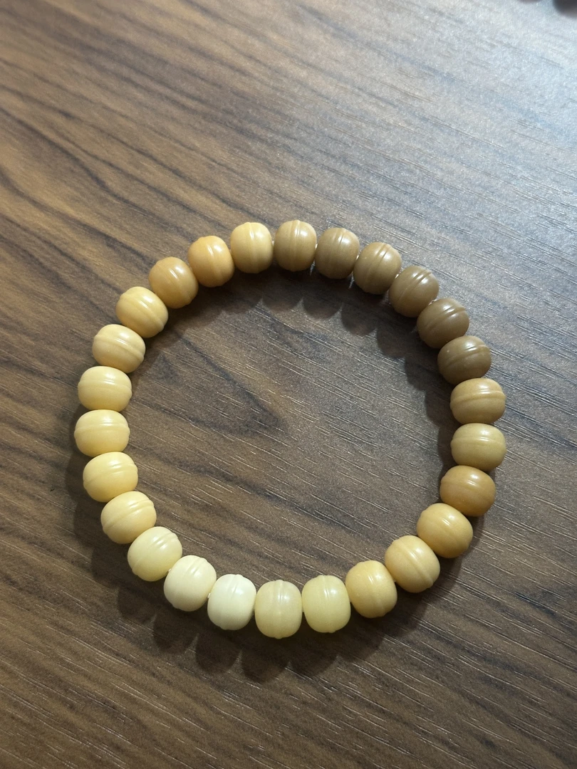 三清文玩*陈化料菩提根铃铛9*8（牛油果）