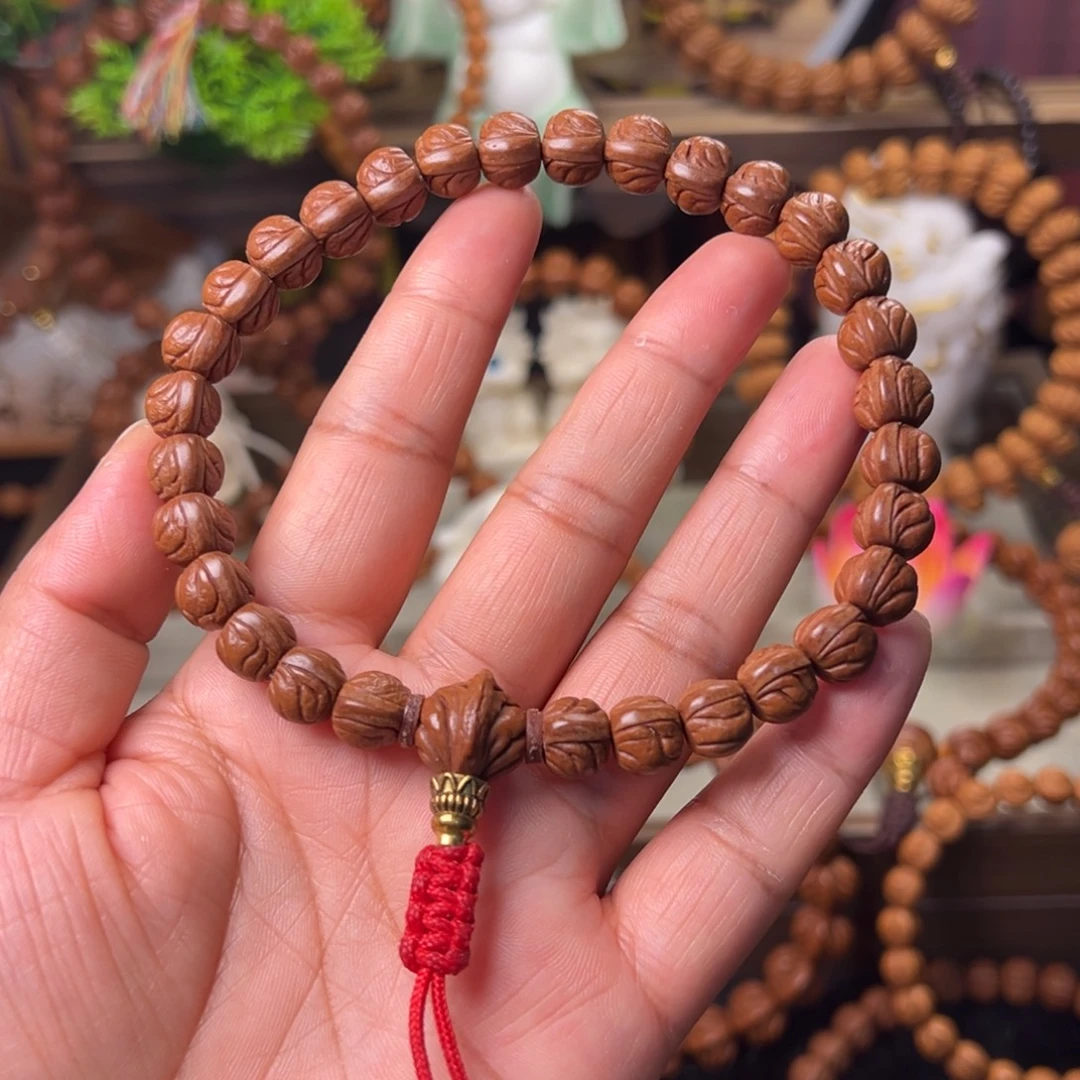 拨***日手串桃核玉龙脊手持10