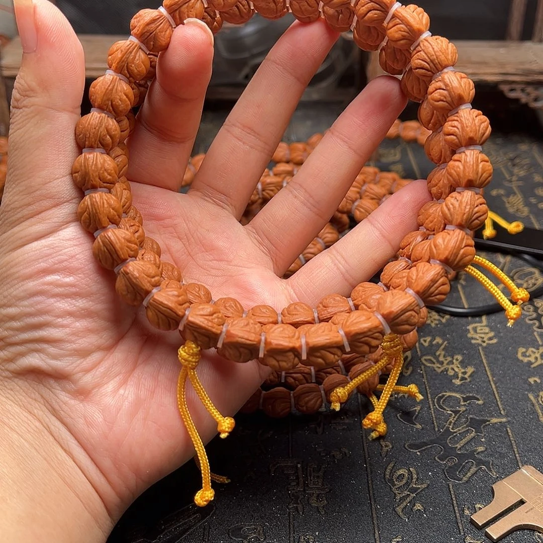 桃核吊坠玉龙手持
