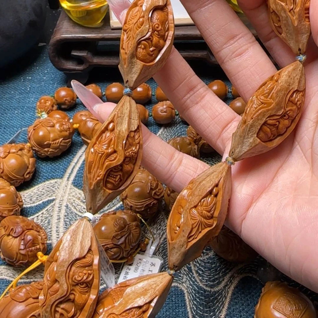 【闪购商品】橄榄核手串包衣一念手持