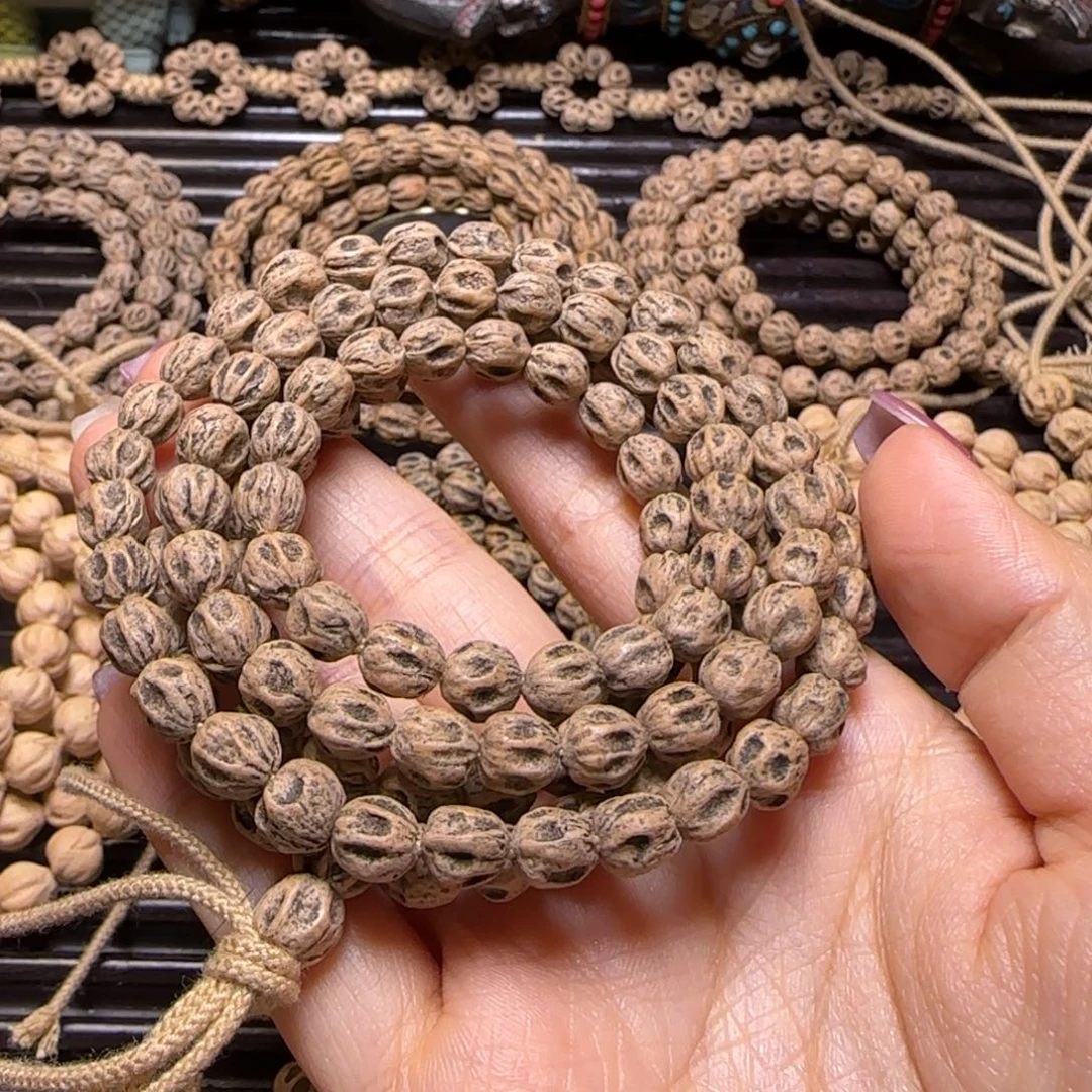 歪***比柏香籽/百香籽吊坠