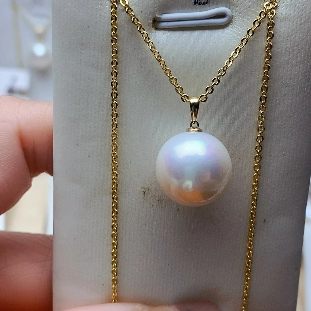 淡水珍珠吊坠(赠链)18K金镶嵌严*娣