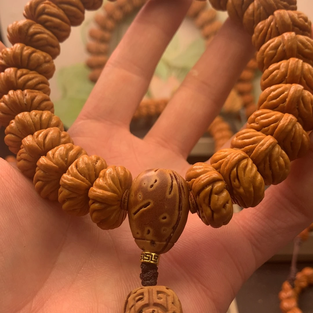 【闪购商品】桃核吊坠西**人20祥云纽扣