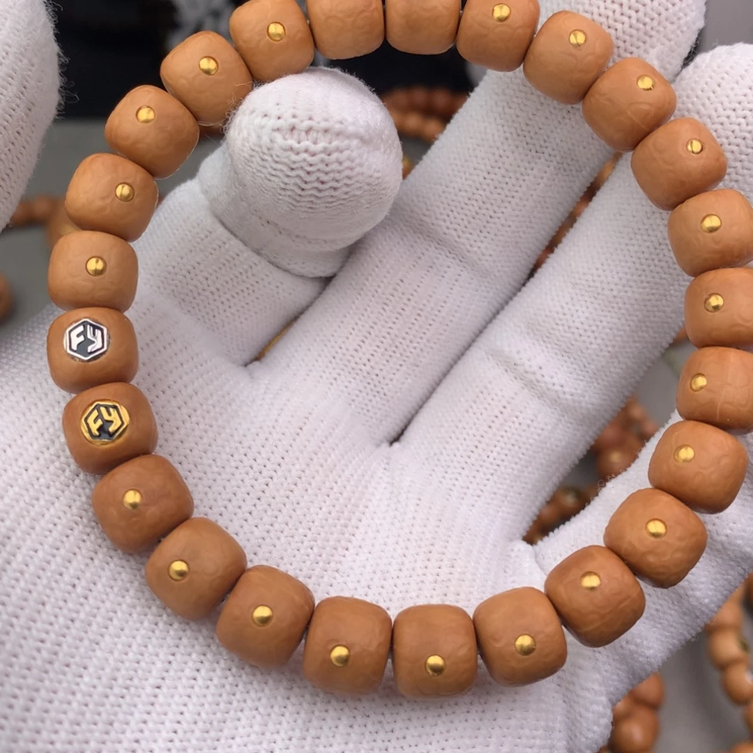 陈***哥猴头核桃手串波澜镶嵌款