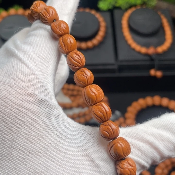 凡***夫木质类精品桃核脖挂