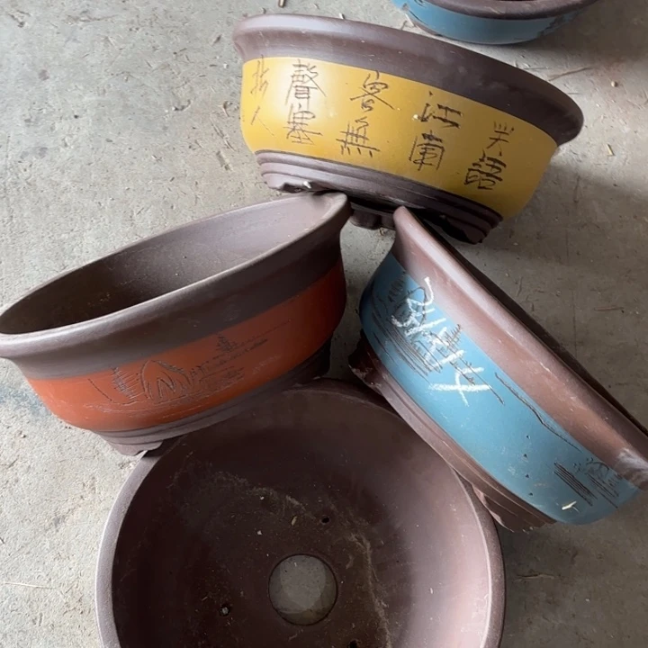 紫砂花盆100-4。      34-14。