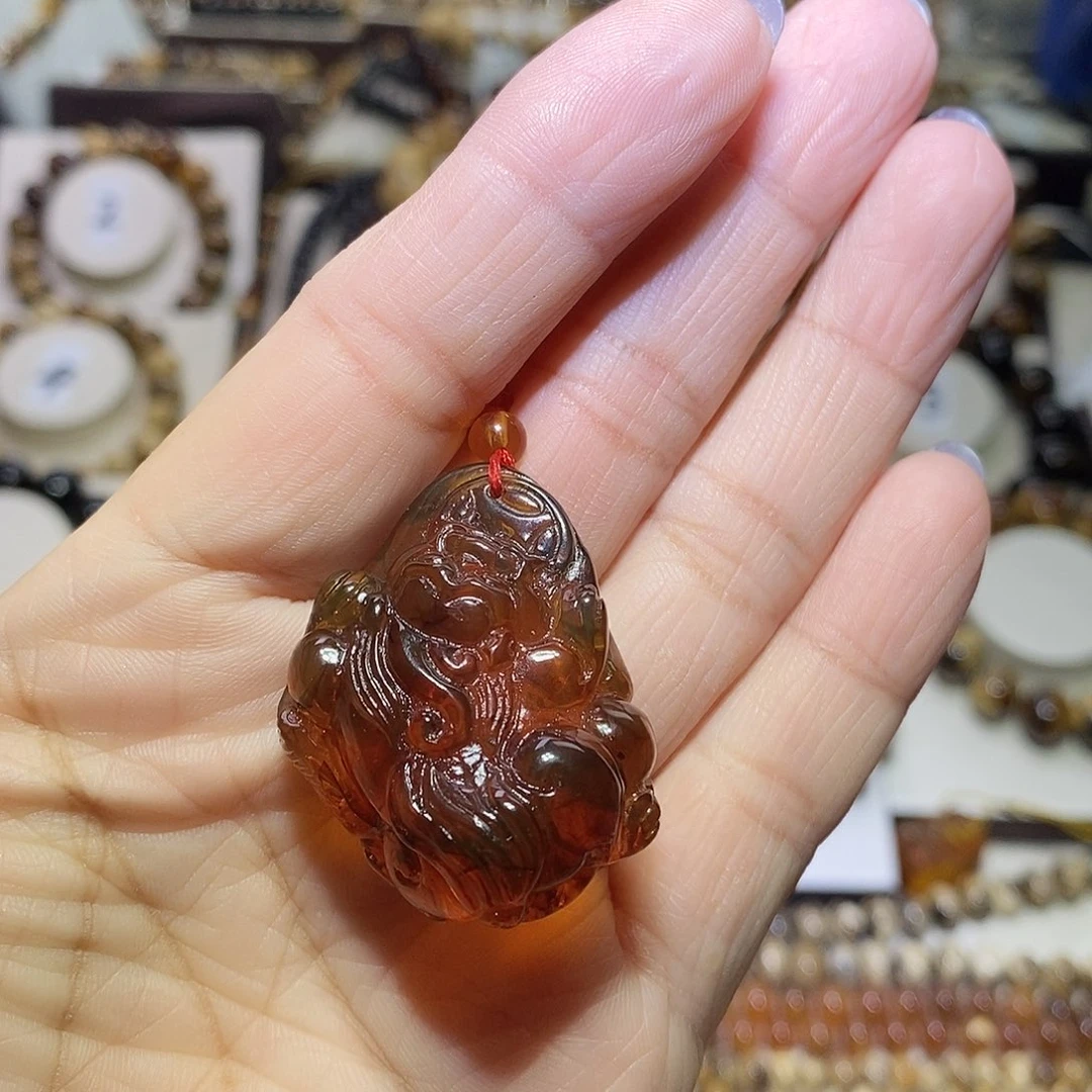 L****琥珀未镶嵌裸石豆油红