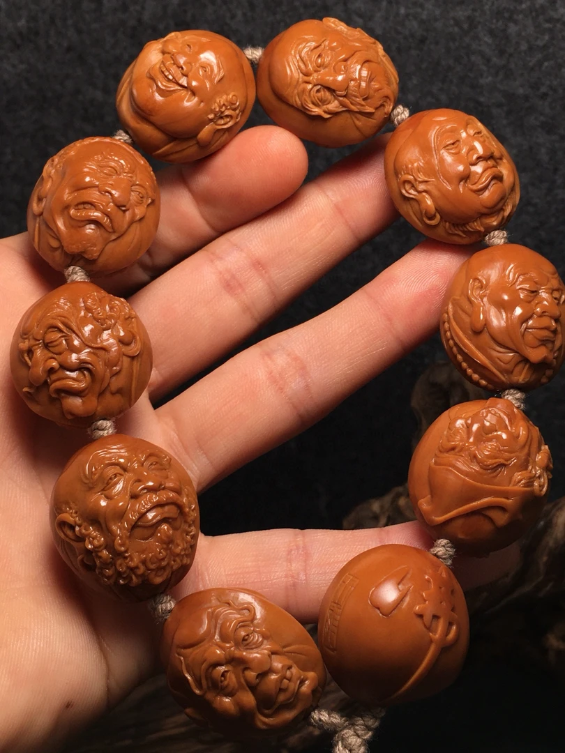 张世龙大师浮雕十八罗汉2.3×2.7橄榄核手串巅峰之作