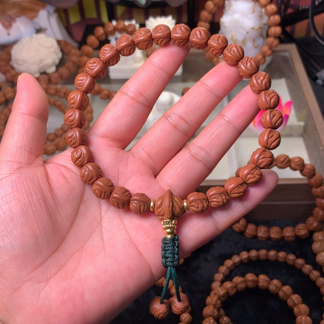 润***.吊坠桃核野生籽手串10