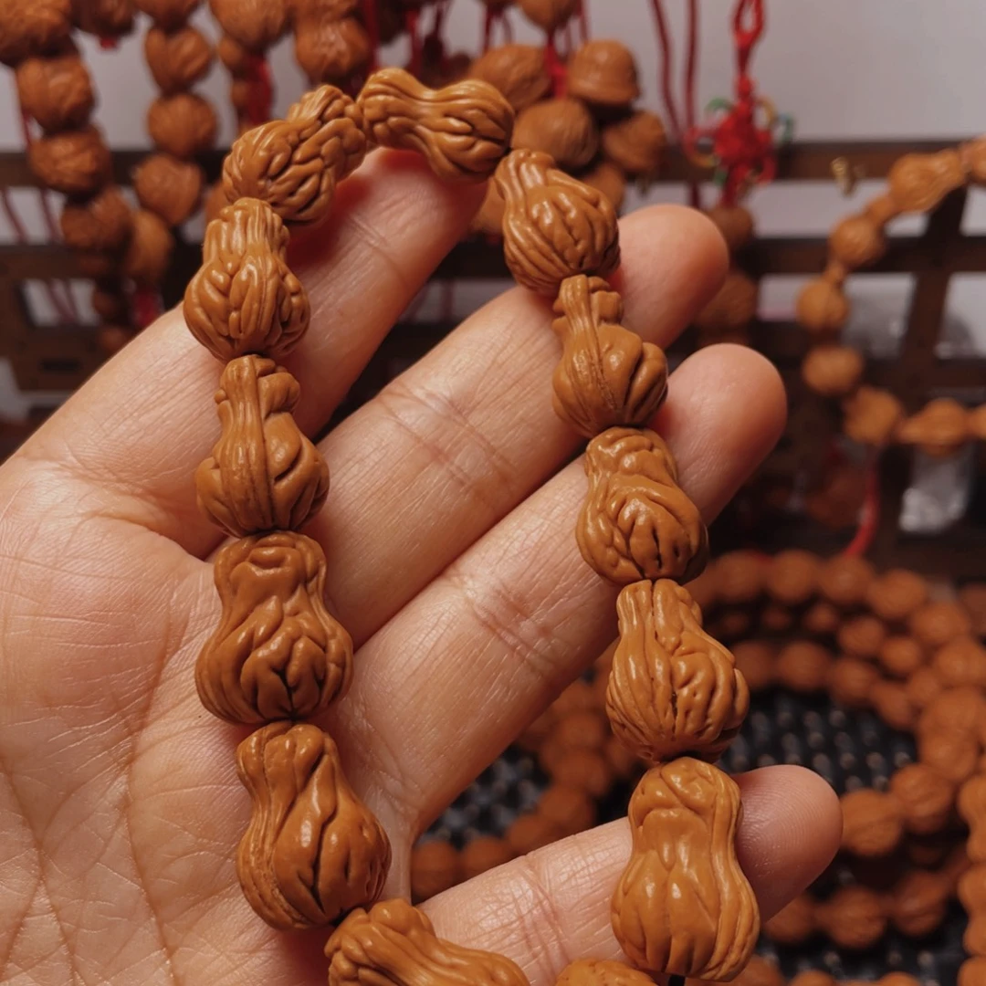 木质类龙纹桃枭手串
