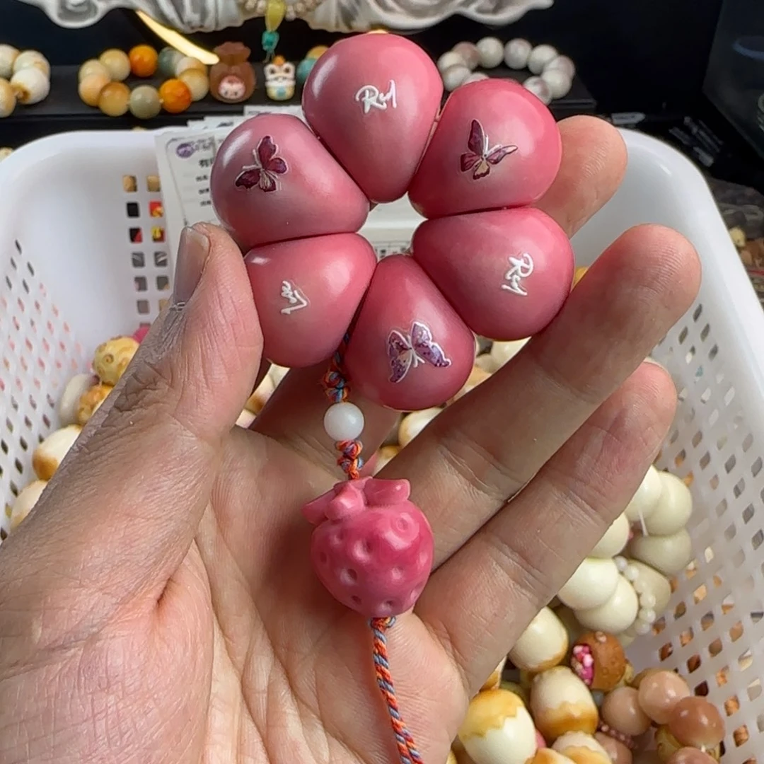 下***伞菩提根/象牙果吊坠瑕疵25粉色蒜瓣手捻1个