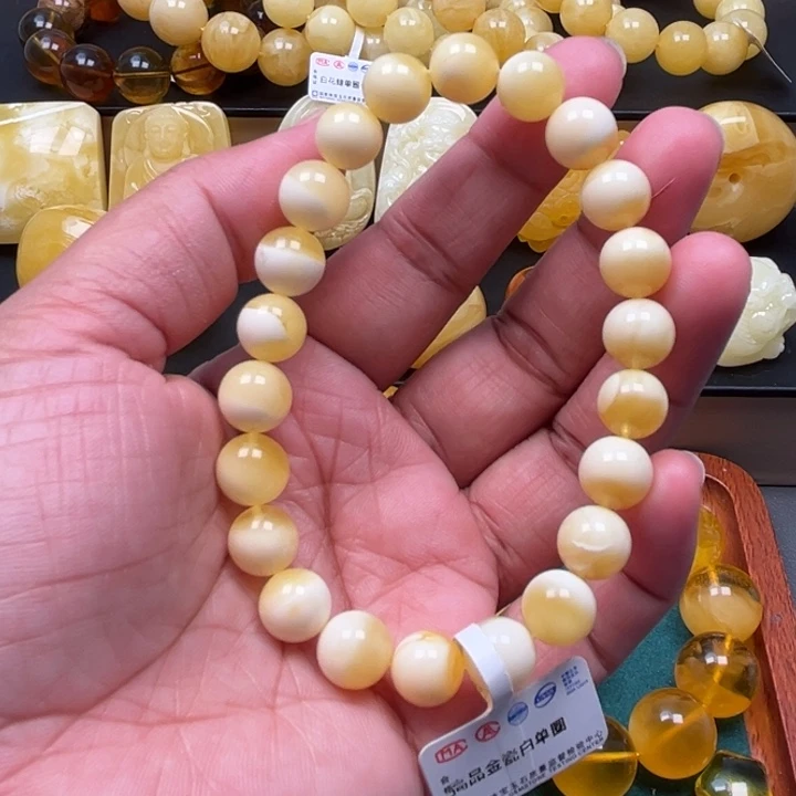 琥珀未镶嵌珠宝奇石M26号9.5+金瓷白妖花