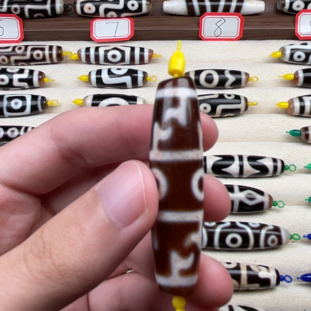 周***童玛瑙/玉髓裸珠48.8 12.3 行运三眼图腾