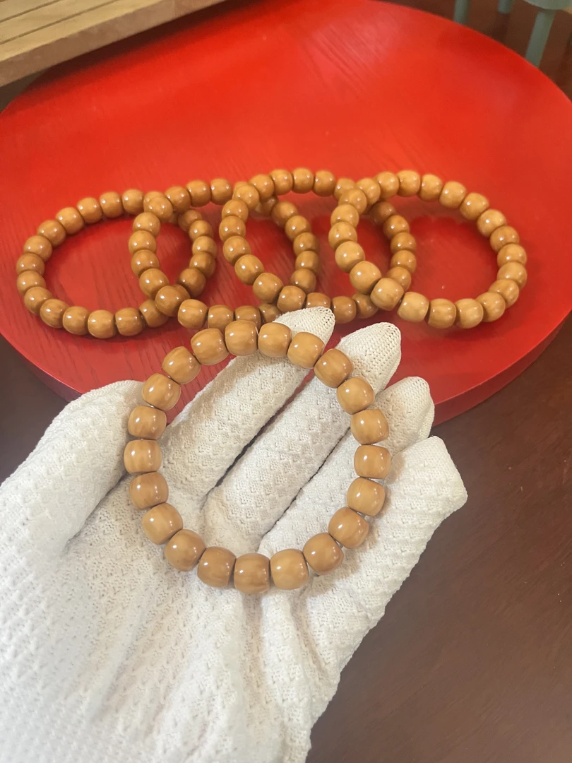 微瑕直切猴头雕刻手串文玩