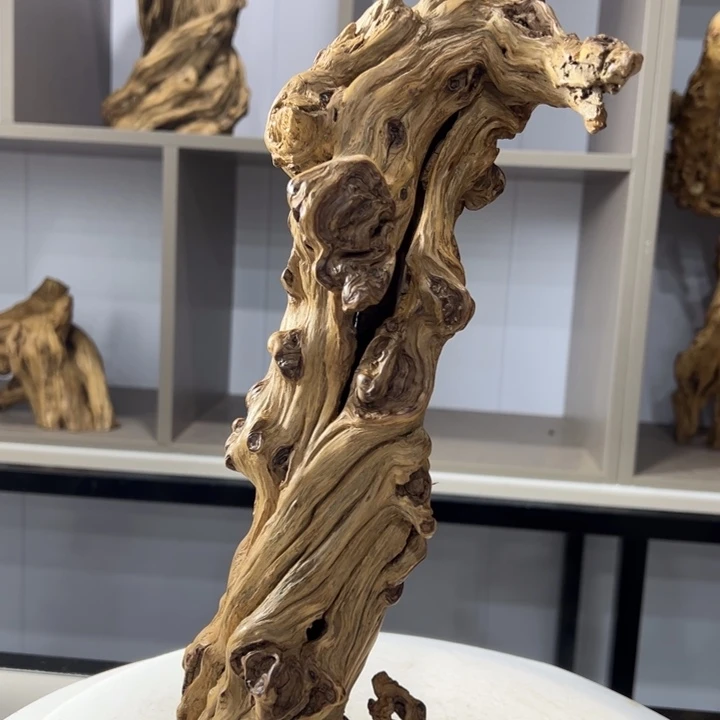 卡***黑木石榴木榴疤摆件
